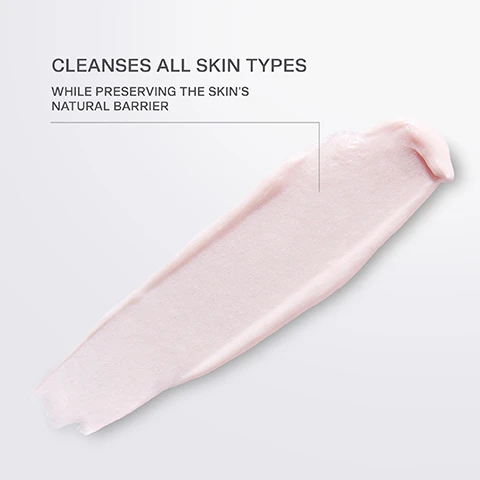 Image 1 - A smooth, light pink cream is spread across a white background with the text cleanses all skin types while preserving the skins natural barrier.
Image 2 - A serene lake surrounded by mountains under a twilight sky, featuring the text La Prairie A Swiss luxury house crafting ultimate skincare.