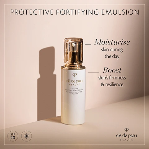Image 1 - A white bottle of protective fortifying emulsion from Clé de Peau Beauté with a gold cap, casting a shadow against a light background, featuring text that reads Protective Fortifying Emulsion, Moisturise skin during the day, Boost skins firmness & resilience, and SPF 20.
Image 2 - An image displaying three skincare products arranged on a light surface: a blue serum labeled le serum The Serum, a golden hydro-softening lotion labeled Hydro-Softening Lotion, and a white protective fortifying emulsion labeled Protective Fortifying Emulsion, with the text Key Radiance Care Day Ritual above and numbered steps 1 Awaken, 2 Nurture, and 3 Boost beside each product.