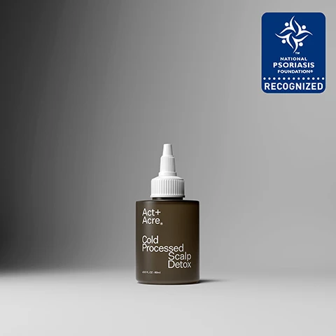 Image 1 - A bottle of Act + Acre Cold Processed Scalp Detox with a pointed applicator cap, standing on a gradient grey background, features a recognition logo from the National Psoriasis Foundation in the top right corner.
Image 2 - A woman with curly hair and freckles holds a small bottle of scalp treatment, with text on the side indicating proven benefits, key ingredients, and application instructions, including gently breaks down build-up, reduces dry scalp itch, Baobab Oil, and pre-shower, applied to scalp.
Image 3 - A comparison image showing two sections of a scalp; the left side labeled Before with visible dandruff and dryness, and the right side labeled After appearing clean and healthy.
Image 4 - A comparison image showing a close-up of hair with visible flakes on the left labeled Before, and smooth hair without flakes on the right labeled After.
Image 5 - Image shows a side-by-side comparison of a persons hair, with the left side labeled Before showing visible dandruff and the right side labeled After displaying clean, smooth hair without dandruff.
Image 6 - Infographic displaying statistics with four circular graphs: 95% agree buildup was reduced, 90% agree they noticed less flaking, 89% agree scalp felt less itchy, and the text Proven Results with a note about results from a consumer perception study with all hair and scalp types.
Image 7 - A dark-colored bottle of Act + Acre Cold Processed Scalp Detox sits on a green leaf, with text next to it reading Sunflower Oil breaks down build-up + supports a healthy scalp microbiome, with iconography indicating soothing, cleansing, and balancing properties.
Image 8 - Image shows a label for Scalp Detox ingredients, listing Basil Leaf (1.37%), Baobab Oil (1.28%), and Moringa Oil (1.28%), along with descriptions of their benefits, and sections on production (ethical labor 100%, cold processed) and packaging (bottle and nozzle made from PET plastic, 85% recyclable, box material certified post-consumer recycled).
Image 9 - Image shows a graphic explaining the benefits of the Cold Processed method, featuring a chart that indicates 97% nutrients retained with Cold Processed and 10% nutrients retained with heat processing, alongside a description of the Cold Processed method.
Image 10 - A hand with polished nails is shown holding a bottle of a scalp treatment, with text on the image detailing the treatment effects over time: 1-2 uses removes itch-causing buildup, 3-4 uses restores scalp moisture barrier, and 5-6 uses scalp feels hydrated, moisturized, + balanced.
