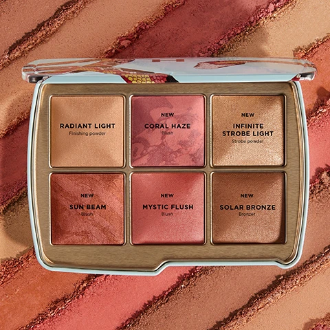 Image 1, radiant light finishing powder, new coral haze blush, new infinite strobe light strobe powder, new sun beam blush, new mystic flush blush, new solar bronze bronzer. image 2, diffuse enhance and glow in a single compact. use individually or layer together. natural flush and radiant glow finish. photoluminescent technology refines skin's appearance. image 3, nonhuman rights project 5% of profits from unlocked support the nonhuman rights project in their efforts to secure fundamental rights for animals.