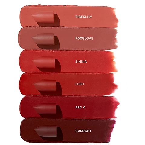 image 1, product swatches of tigerlily, foxglove, zinnia, lush, red o and currant. image 2, swatches of magnolia, tulip, poppy, peony, sparrow, orchid, tigerlily, foxglove, zinnia, lush, red o and current on three different skin tones. image 3, model shots of tigerlily, foxglove, zinnia, lush, red o and currant. on three different skin tones. image 4, nonhuman rights project. 5% of net profits from unlocked support the nonhuman rights project in their efforts to secure fundamental rights for animals. image 5, buiuldable color, soft matte finish. all day wear. primer infused conditioning formula.