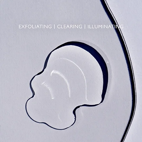 Product droplet on a clear palette with the text EXFOLIATING, CLEARING, ILLUMINATING.