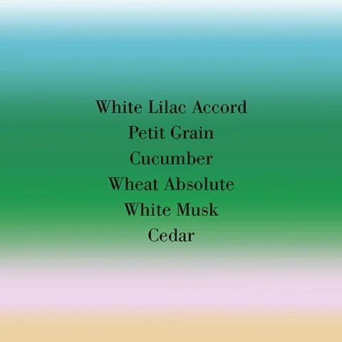 A gradient background in shades of green and pale pink with visible text listing ingredients: White Lilac Accord, Petit Grain, Cucumber, Wheat Absolute, White Musk, Cedar.