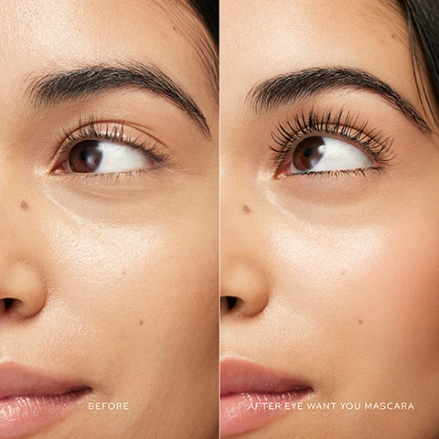 Image 1 - Image shows a close-up of a womans face divided into two halves; the left side shows her with minimal eye makeup labeled BEFORE, while the right side displays her with fuller eyelashes after applying mascara, labeled AFTER EYE WANT YOU MASCARA.
Image 2 - A large red mascara tube labeled ORIGINAL stands next to a smaller red mascara tube labeled PETITE, with a mascara brush emerging from the smaller tube, and an arrow pointing to it with the text Travel Ready!
Image 3 - Image shows a woman with long blonde hair, with a split comparison of her face before and after applying mascara; visible text includes BEFORE on the left and AFTER EYE WANT YOU MASCARA on the right.
Image 4 - A red mascara tube with a black applicator wand is displayed against a solid red background, with visible text: ULTRA-CREAMY TEXTURE FOR MAXIMUM BUILD CARNUBA & CANDELILLA WAX BLEND NOURISHES AND PROTECTS LASHES SHEA BUTTER RICH PIGMENT PAYOFF, HELPS BOOST WEAR TIME PLANT-DERIVED ESTER.
Image 5 - A close-up of a woman applying mascara with a brush, showcasing her eye and part of her face, with a red mascara tube in her hand.
Image 6 - An image of a red mascara tube and an applicator brush with a close-up view, accompanied by text that describes the brush as being expertly crafted with details about its plant-based fiber, hourglass shape for volumizing and defining, and a tapered tip for smaller lashes. Visible text includes: EXPERTLY CRAFTED BRUSH Made with plant-based fiber, and eco-friendly material Hourglass shape volumizes, defines and grips Tapered tip helps with detailing on smaller lashes.
Image 7 - A swatch of black paint with textured brush strokes, accompanied by the text CLEAN BLACK below it.