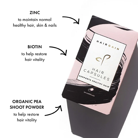 Image 1 - An angled view of a box labeled Hairgain Hair Capsules, which includes text highlighting the benefits of zinc, biotin, and organic pea shoot powder for maintaining healthy hair, skin, and nails; the box shows that it contains 60 capsules.
Image 2 - Colorful packaging for Hair Gain Capsules on a light background, featuring benefits such as supporting healthy hair, containing clinically-tested AnaGain™ Pe Shoots, and being vegetarian, vegan, and halal certified.
Image 3 - Image shows two side-by-side photos of a persons scalp, with the left labeled BEFORE showing thin hair, and the right labeled AFTER displaying thicker, healthier-looking hair.
Image 4 - Image showing two photos in a side-by-side comparison labeled BEFORE and AFTER, depicting a persons scalp with hair before and after treatment, with the BEFORE image showing thinning hair and the AFTER image showing fuller hair.
Image 5 - A split image showing a womans hairstyle before and after styling, with the word BEFORE on the left image and AFTER on the right image.
Image 6 - Image shows two side profile photographs of a woman with long, straight, light blonde hair; the left side is labeled BEFORE and shows thinner hair at the scalp, while the right side is labeled AFTER and displays thicker, fuller hair.
Image 7 - A woman with long blonde hair is holding a blister pack of capsules above a pink box labeled Hair Gain Hair Capsules, accompanied by a speech bubble containing customer feedback about the product.
Image 8 - A woman with long, blonde hair holds a pink box labeled HAIRGAIN HAIR CAPSULES while looking directly at the camera, with text above stating CONSISTENCY IS KEY! Take the hair capsules every day for a minimum of 3 months to ensure the super nutrients and hair boosting vitamins have adequate time to build up stores in the body and impact the hair growth cycle.