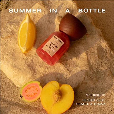 Image 1 - A bottle of perfume with a wooden cap sits on a stone, surrounded by a half lemon, a peach, and a pink guava, with text reading SUMMER IN A BOTTLE and WITH NOTES OF LEMON ZEST, PEACH, & GUAVA.
Image 2 - A woman with long dark hair is spraying a fragrance on her neck, with a clear blue sky in the background, and the text reads SMELLS LIKE Sun-kissed evenings on la isla.
Image 3 - A person with wavy hair is holding a pink bottle of hair product and spraying it into the air, with the text LONG-LASTING, HAIR PROTECTION, ALCOHOL-FREE, and GLOWY SHIMMER displayed beside them.
Image 4 - A close-up image of a neck area showing the difference in skin appearance before and after treatment, with the word BEFORE below the left side and AFTER below the right side.
Image 5 - Two fragrance bottles are displayed side by side: on the left is a yellow bottle labeled PERFUME de la TIERRA with a brown wooden cap, described for body use with the scent notes WARM WOODY CITRUSY, while on the right is a pink bottle labeled PERFUME MIST de GUAVA with a similar wooden cap, described for hair and body use with the scent notes FRESH SWEET TROPICAL.
Image 6 - Image shows a three-step hair care routine with product bottles labeled as Guava Rescue Spray, Guava Leave-in Conditioner, and Perfume Mist de Guava, along with text instructions for each step: Protect, Hydrate, Finish, and their corresponding descriptions.
Image 7 - An image divided into three sections showing cross-sections of fruits: the top section reveals lemon zest, the middle section displays the heart of a peach, and the bottom section features guava, with the words TOP LEMON ZEST, HEART PEACH, and BASE GUAVA prominently labeled.