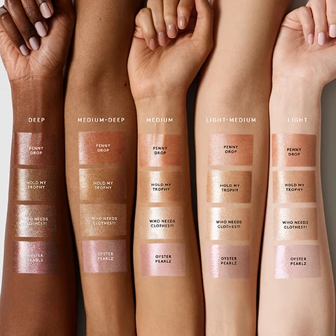 Image 1 - A lineup of five arms with different skin tones holds swatches of makeup shades, labeled as Deep, Medium-Deep, Medium, Light-Medium, and Light, with visible text indicating the names Penny Drop, Hold My Trophy, Who Needs Clothes?!, and Oyster Pearlz under each swatch.
Image 2 - An image of fabric draped in various shades of shimmery colors, with the text that reads ULTRA-LIT RADIANCE YEAR-ROUND followed by a list of features including four universal shades for all, dewy high-shimmer finish, non-sticky gel-based formula, light-diffusing microparticles plus sheer tint, and luxurious floral scent.
Image 3 - A person with a toned physique wearing a metallic bronze bikini poses confidently against a bright orange background, with text that reads APPLY TO CHEST, ARMS, TORSO + LEGS FOR SKIN THAT GLOWS.
Image 4 - A bottle of Fenty Beauty Body Lava with a kabuki brush beside it is displayed on a golden background, accompanied by text that reads MESS-FREE APPLICATION, STEP 1: Pump Body Lava directly onto skin, and STEP 2: Use brush to blend into skin for a streak-and mess-free glow, along with FACE & BODY KABUKI BRUSH 160.