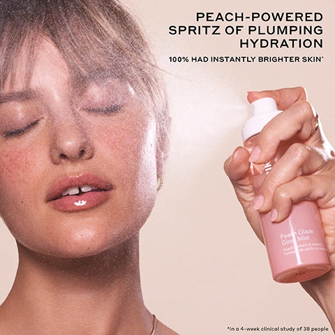 Image 1 - Close up of a woman spraying face mist from a pink bottle with text reading PEACH-POWERED SPRITZ OF PLUMPING HYDRATION 100% HAD INSTANTLY BRIGHTER SKIN* Peach Glaze Glow Mist Peach ferment & vitamin C Ferment de pêche et vitamine C *In a 4-week clinical study of 38 people. Image 2 - A split image comparison shows a persons face before and after 4 weeks of treatment, highlighting improved skin brightness and texture in the circled cheek area, with text reading BEFORE 4 WEEKS INCREASED SKIN BRIGHTNESS +37% OVER 4 WEEKS *In a 4-week clinical study on 38 people. Image 3 - A split image shows a womans face before and instantly after using a product, with dotted circles highlighting the cheek area, with text reading BEFORE INSTANT INSTANTLY HYDRATES + BRIGHTENS* *In a 4-week clinical study on 38 people. Image 4 - A pink and orange spray bottle of skincare product leans against a peach with water droplets, and text overlay reads OLEHENRIKSEN TRUTH Peach Glaze Glow Mist Peach ferment & vitamin C Ferment de pêche et vitamine INSTANT and up to 8 hour hydration* 100% had instantly brighter skin* Increased skin brightness by 37%* *In an 8-week clinical study of 37 people. Image 5 - Image showing water droplets and circles featuring close-ups of peach slices, a whole peach, orange liquid with bubbles, and yellow berries with the text A SPRITZ OF PLUMPING HYDRATION PEACH FERMENT brighten + provide antioxidant-rich hydration PEACH FRUIT WATER Hydrates + refreshes ENHANCED VITAMIN C brightens + defends against pollution SCANDINAVIAN CLOUDBERRY WATER Boost of antioxidant-rich hydration. Image 6 - A misted orange spray bottle with text reading OLEHENRIKSEN and TRUTH, and overlay text that says ULTRA-FINE MIST + JUICY PEACH SCENT TO REVIVE THIRSTY SKIN. Image 7 - An image displays a peach next to OLEHENRIKSEN Peach Glaze skincare products, including a tube of Pout Preserve squeezing product onto the peach, a bottle of Glow Mist, and a bottle of Niacinamide Serum, with visible text reading THE JUICY CLINICAL RESULTS YOUR SKIN CRAVES, PEACH GLAZE GLOW NIACINAMIDE SERUM A plush, peach-powered gel serum to clinically brighten+ plump with every pump In a 4-week clinical study on 37 people, PEACH GLAZE GLOW MIST An ultra-fine facial mist for brightening + hydration instantly and over time In a 4-week clinical study on 38 people, PEACH GLAZE POUT PRESERVE A juicy squeeze of sweet peach for fuller-looking lips in 1 week In a 8-week clinical study on 39 people, along with product details Kokum butter acai sterols & peptides Beurre de kokum sterols daçai et peptides and Peach extract niacinamide & vitamin C Extrait de pêche niacinamide et vitamine C.