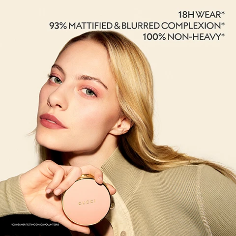 Image 1-5 - A woman with blonde hair holds a round, light pink Gucci compact with gold trim, with her face visible in the background, featuring text that reads 18H WEAR*, 93% MATTIFIED & BLURRED COMPLEXION*, 100% NON-HEAVY*, GUCCI, and * CONSUMER TESTING ON 102 VOLUNTEERS. Image 2 - A split image of a mans face and upper body shows the left side with natural skin and subtle imperfections, contrasted with the right side showing a smoother, more even complexion, with the visible text Before 02 After. Image 4 - An open light pink and gold compact powder with an embossed sunburst design and Gucci logo sits on a bed of loose light brown powder, with visible text reading BUTTERMELT TEXTURE, INSTANT BLURRING, LONGWEAR MATTE, and GUCCI appearing on the compact.