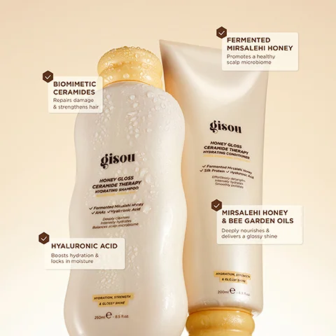A white Gisou Honey Gloss Ceramide Therapy Hydrating Shampoo bottle, 250ml e – 8.5 fl.oz, and a matching Gisou Honey Gloss Ceramide Therapy Hydrating Conditioner tube, 200ml e – 6.9 fl.oz, both with yellow caps and water droplets, feature a range of ingredients and benefits including Biomimetic Ceramides that repair damage and strengthen hair, Fermented Mirsalehi Honey that promotes a healthy scalp microbiome, Hyaluronic Acid that boosts hydration and locks in moisture, Mirsalehi Honey & Bee Garden Oils that deeply nourish and deliver a glossy shine, AHAs, Silk Protein, deep cleansing, intense hydration, balanced scalp microbiome, effortless detangling, and smooth polishing for hydration, strength, and glossy shine.